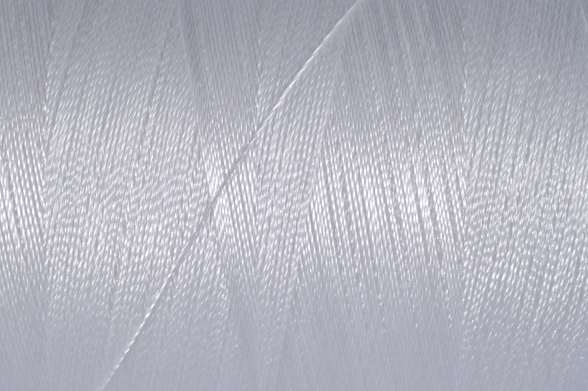 detailed macro of stitched metallic thread